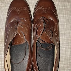 Leather Brown Dress Shoes. Hand made. W/ Soles that gives you support & Height.